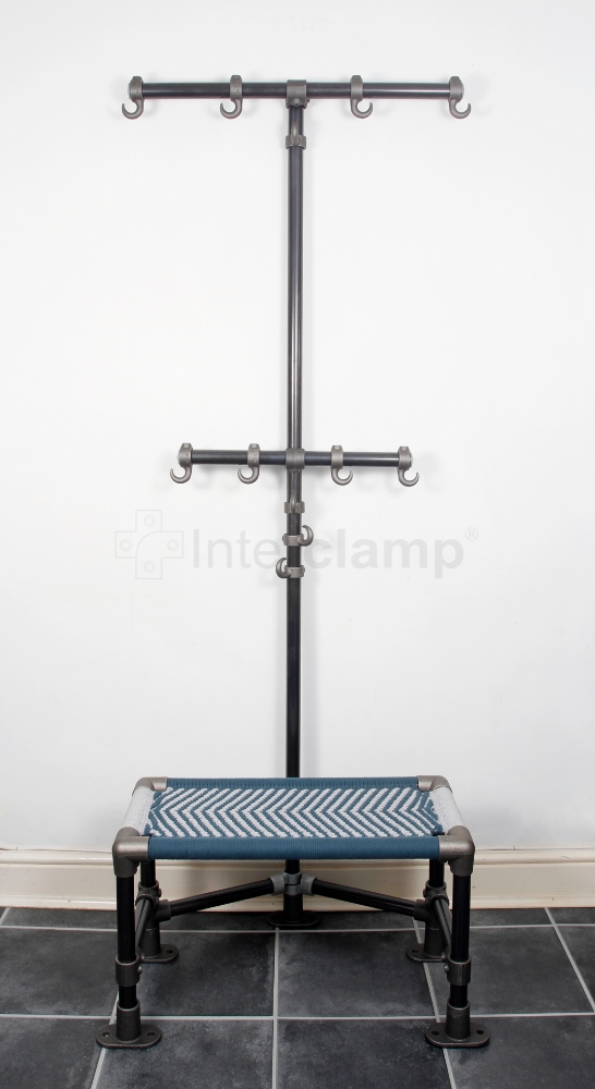 Close-up of a home coat stand constructed with Interclamp key clamp fittings and tube, featuring an integrated seat for added convenience and utility.